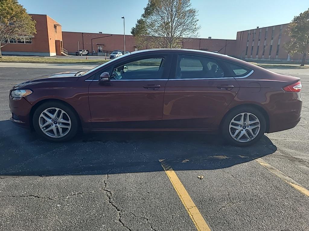 used 2015 Ford Fusion car, priced at $10,000