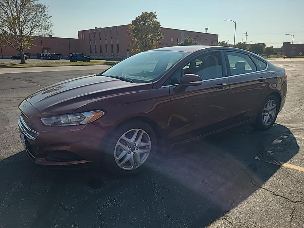 used 2015 Ford Fusion car, priced at $10,000
