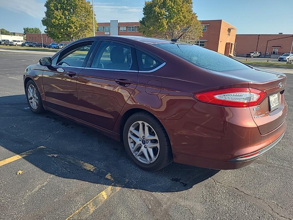 used 2015 Ford Fusion car, priced at $10,000