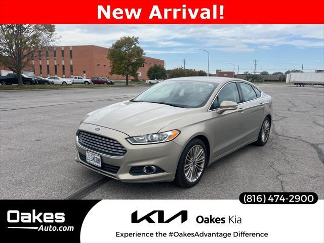 used 2015 Ford Fusion car, priced at $12,000