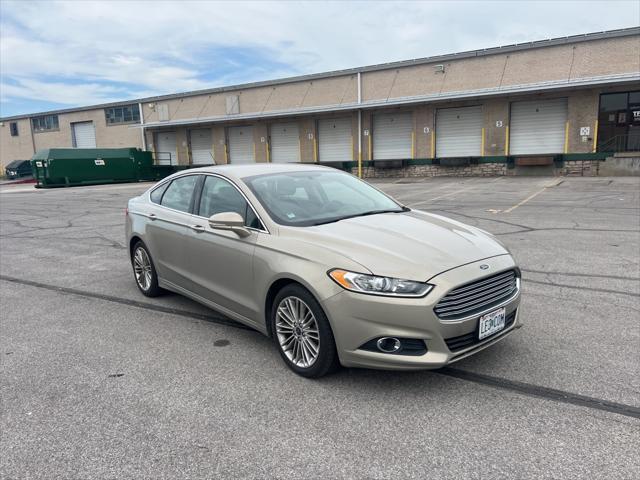 used 2015 Ford Fusion car, priced at $12,000