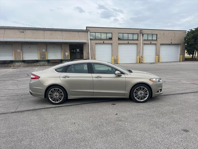 used 2015 Ford Fusion car, priced at $12,000