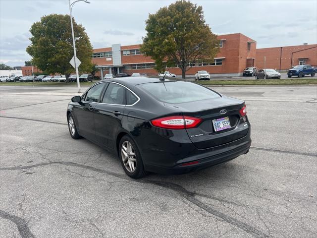 used 2013 Ford Fusion car, priced at $10,000