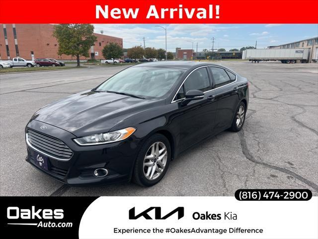 used 2013 Ford Fusion car, priced at $10,000