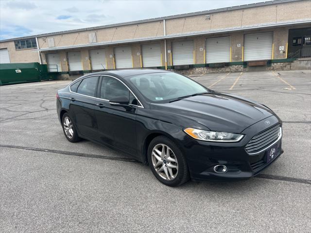 used 2013 Ford Fusion car, priced at $10,000