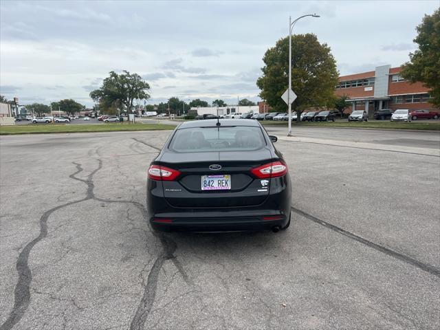 used 2013 Ford Fusion car, priced at $10,000