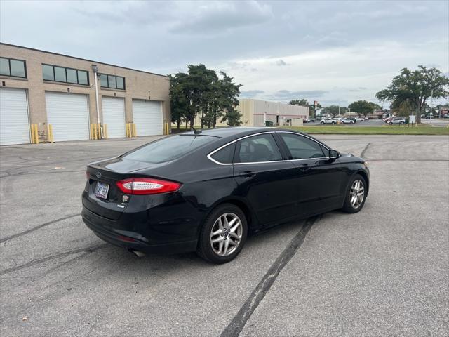 used 2013 Ford Fusion car, priced at $10,000