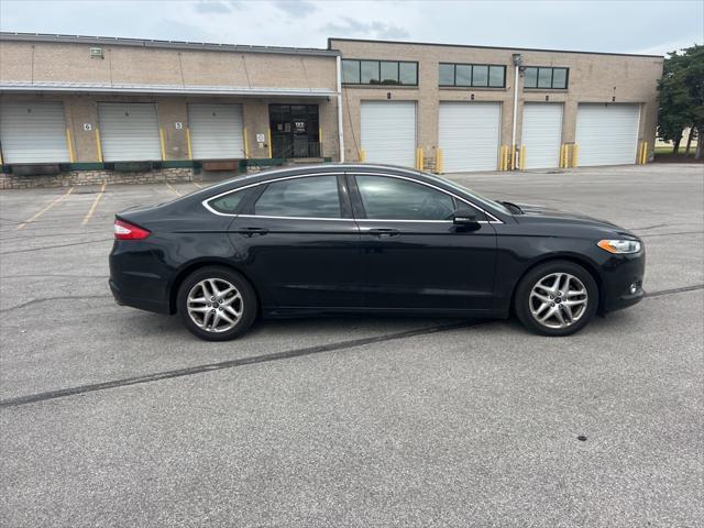 used 2013 Ford Fusion car, priced at $10,000