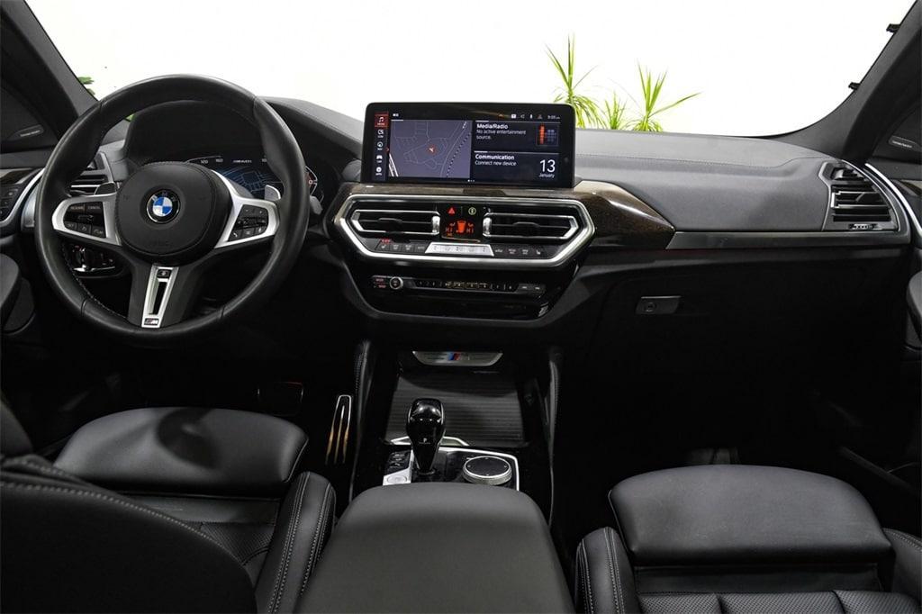 used 2023 BMW X4 car, priced at $55,692