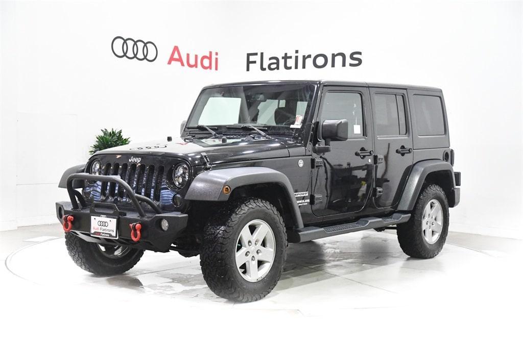 used 2015 Jeep Wrangler Unlimited car, priced at $18,585