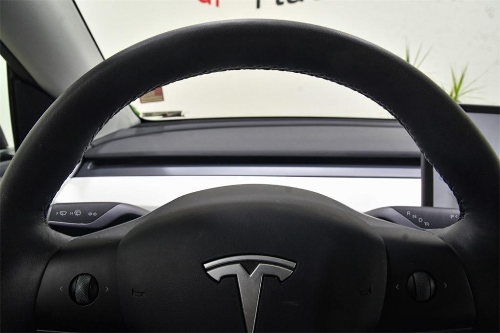 used 2023 Tesla Model Y car, priced at $32,594