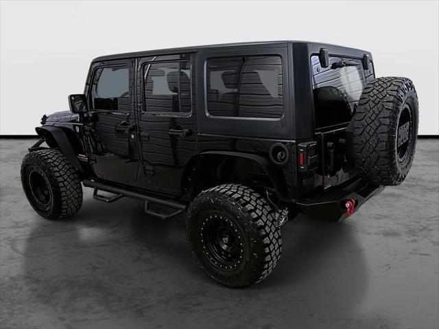 used 2015 Jeep Wrangler Unlimited car, priced at $20,875