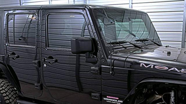 used 2015 Jeep Wrangler Unlimited car, priced at $20,875