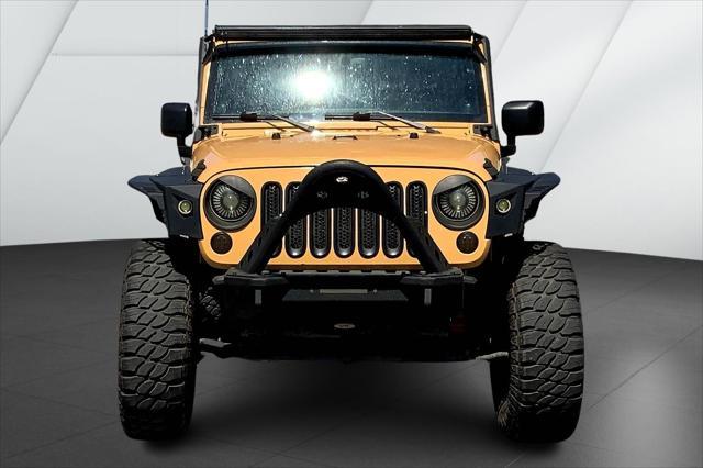 used 2013 Jeep Wrangler Unlimited car, priced at $19,375