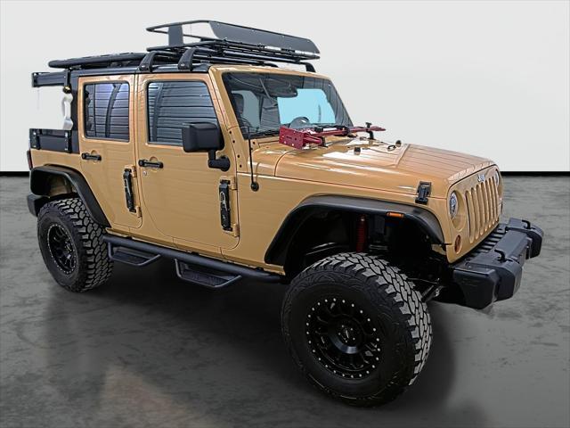 used 2013 Jeep Wrangler Unlimited car, priced at $21,575