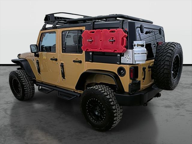 used 2013 Jeep Wrangler Unlimited car, priced at $21,575