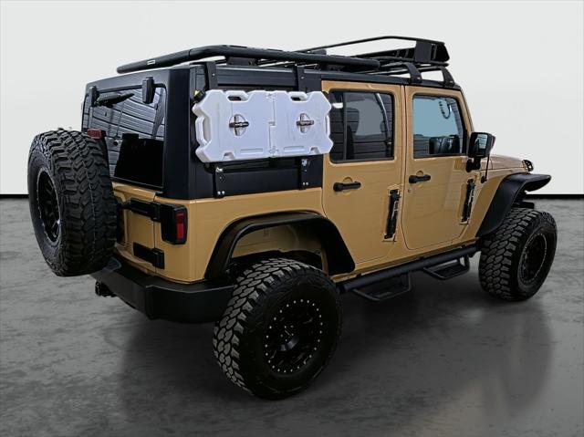 used 2013 Jeep Wrangler Unlimited car, priced at $21,575