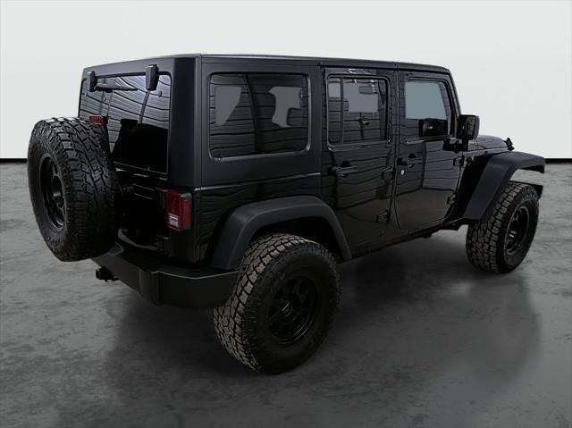 used 2015 Jeep Wrangler Unlimited car, priced at $20,975