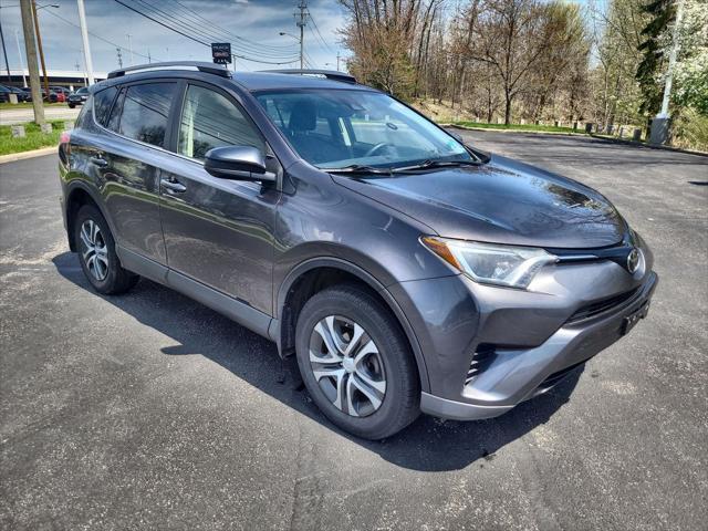 used 2018 Toyota RAV4 car, priced at $19,999