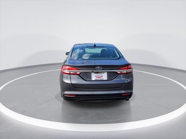 used 2017 Ford Fusion car, priced at $9,999