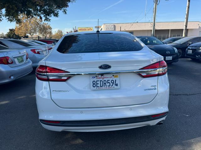 used 2018 Ford Fusion Hybrid car, priced at $11,998