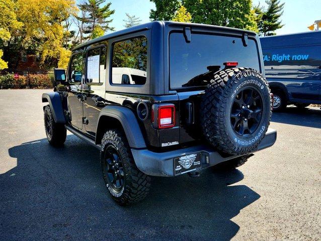 used 2021 Jeep Wrangler Unlimited car, priced at $33,685