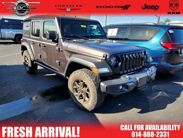 used 2021 Jeep Wrangler Unlimited car, priced at $33,009