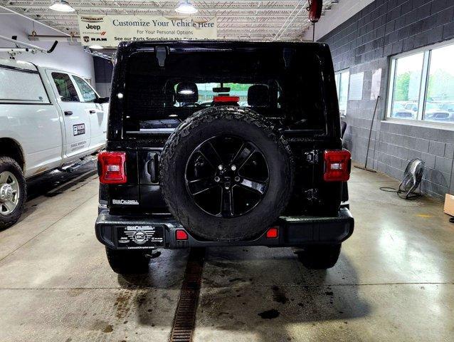 used 2021 Jeep Wrangler Unlimited car, priced at $37,774