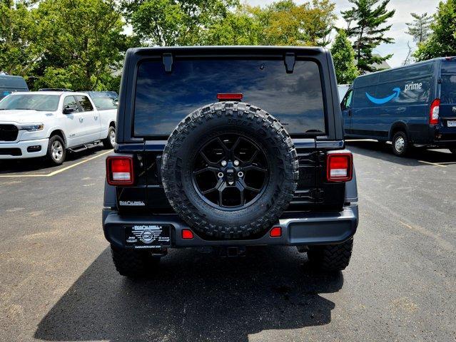 used 2024 Jeep Wrangler car, priced at $38,708
