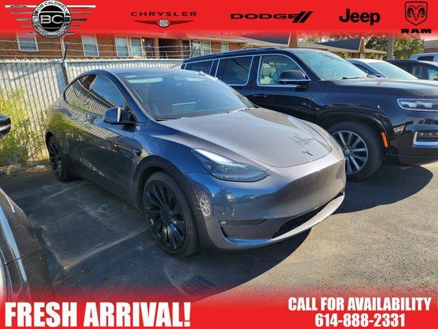 used 2023 Tesla Model Y car, priced at $33,122