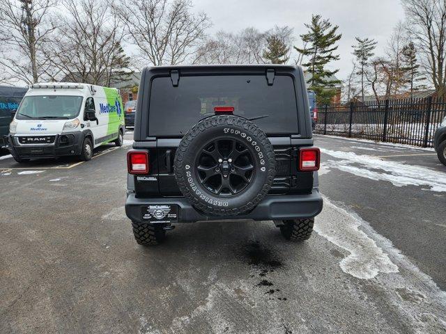 used 2021 Jeep Wrangler Unlimited car, priced at $29,958