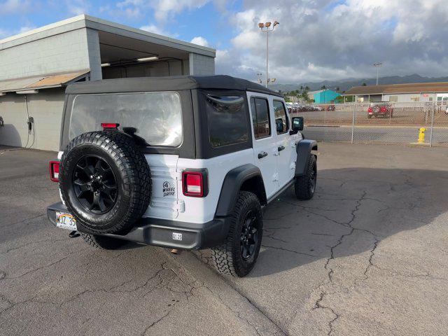 used 2022 Jeep Wrangler Unlimited car, priced at $27,978