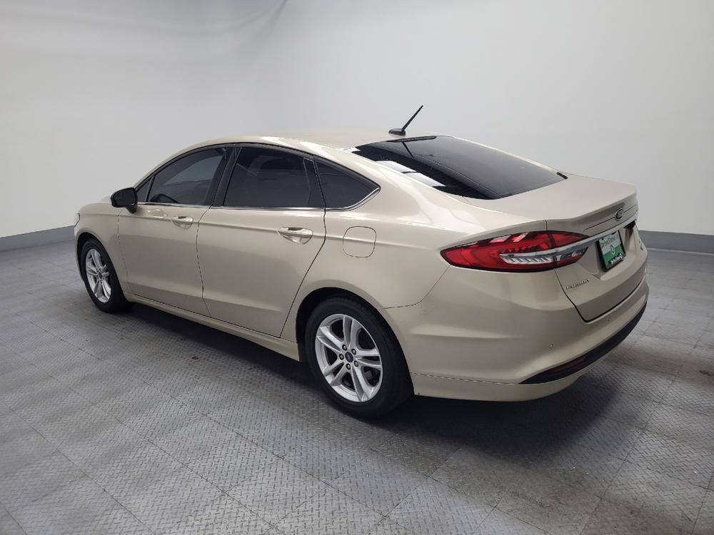 used 2018 Ford Fusion car, priced at $13,295