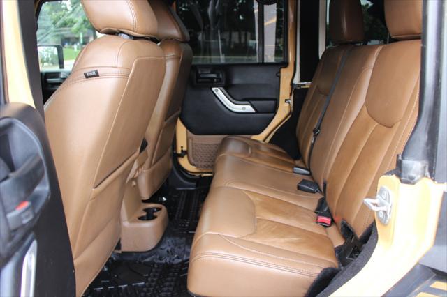 used 2014 Jeep Wrangler Unlimited car, priced at $17,900