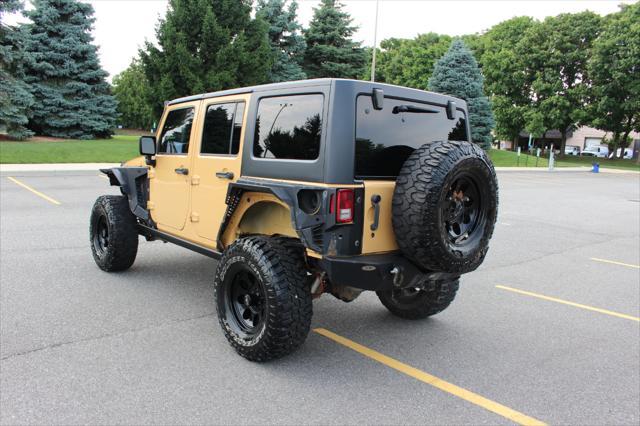 used 2014 Jeep Wrangler Unlimited car, priced at $17,900