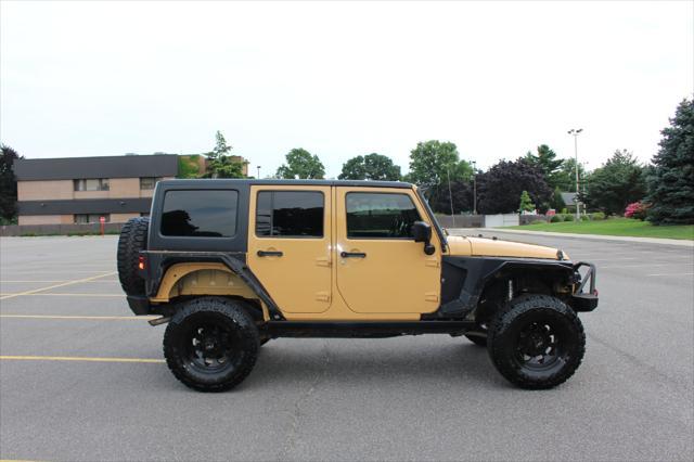 used 2014 Jeep Wrangler Unlimited car, priced at $17,900