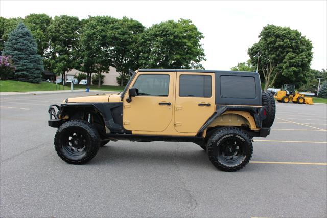 used 2014 Jeep Wrangler Unlimited car, priced at $17,900