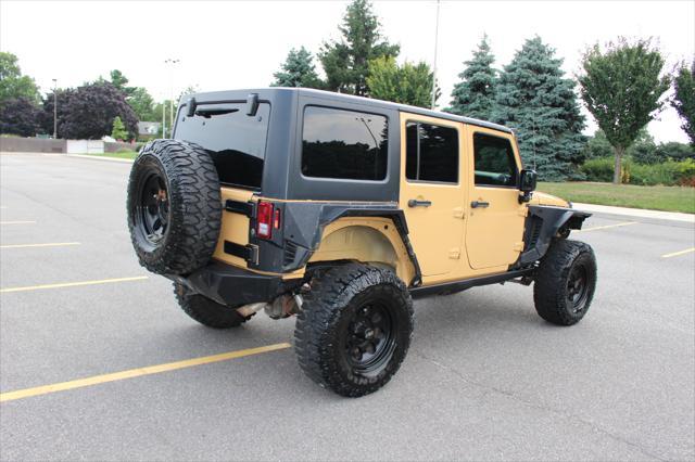 used 2014 Jeep Wrangler Unlimited car, priced at $17,900