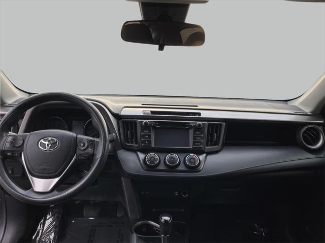 used 2018 Toyota RAV4 car, priced at $9,999