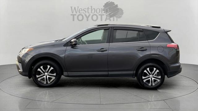 used 2018 Toyota RAV4 car, priced at $9,999