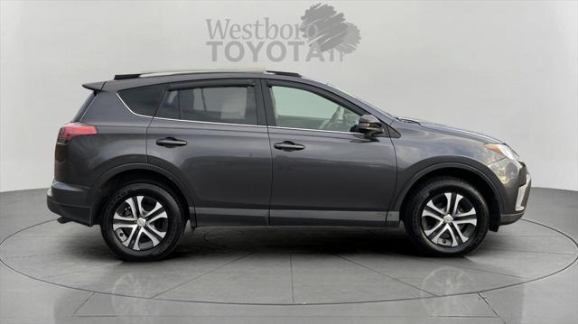 used 2018 Toyota RAV4 car, priced at $9,999