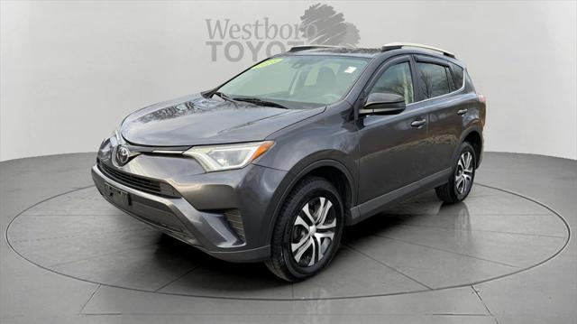 used 2018 Toyota RAV4 car, priced at $9,999