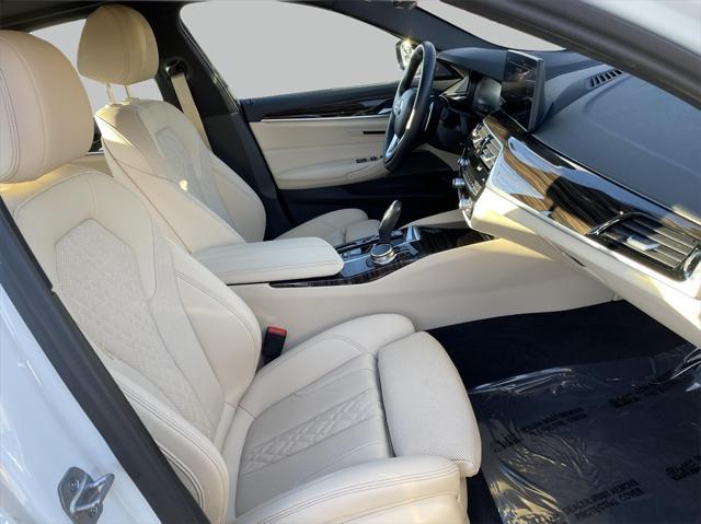 used 2023 BMW 530e car, priced at $35,000