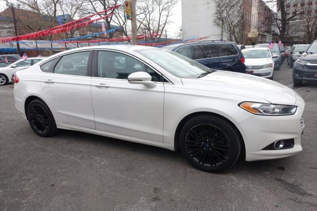 used 2016 Ford Fusion car, priced at $7,488