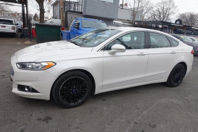 used 2016 Ford Fusion car, priced at $7,995