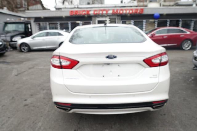 used 2016 Ford Fusion car, priced at $7,995