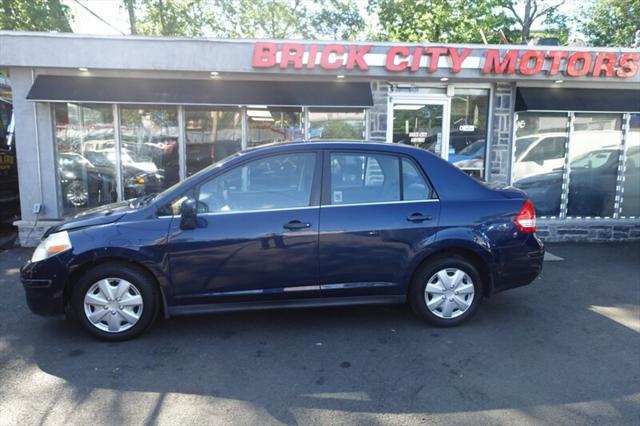 used 2009 Nissan Versa car, priced at $2,788