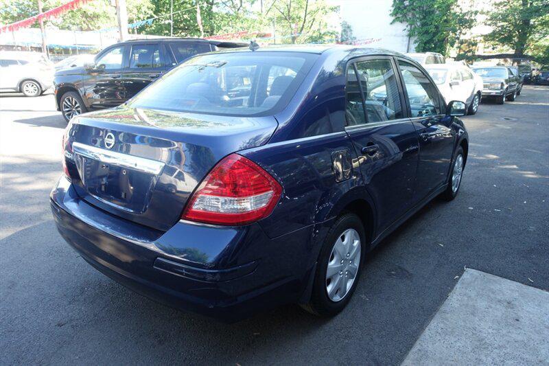 used 2009 Nissan Versa car, priced at $2,788