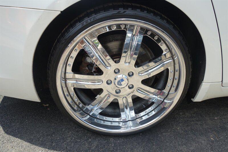 used 2012 BMW 750 car, priced at $9,788