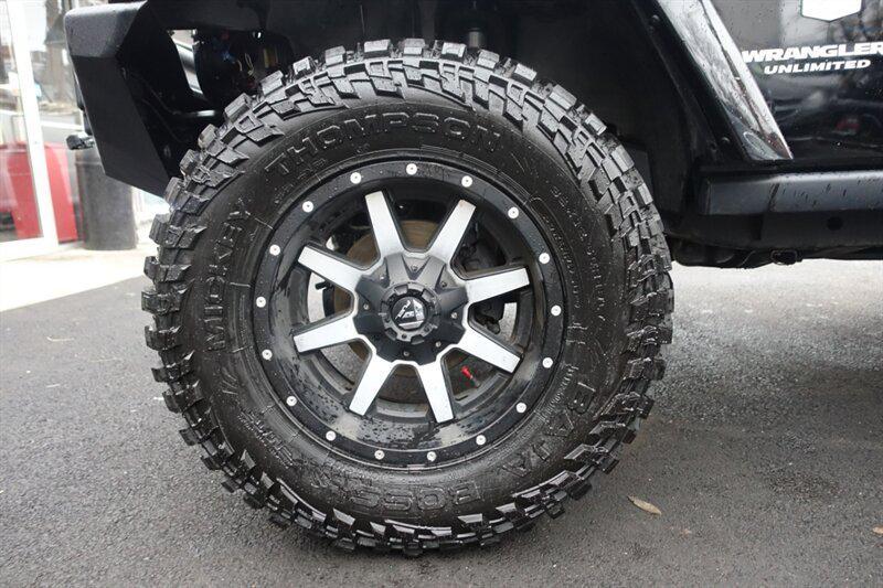 used 2011 Jeep Wrangler Unlimited car, priced at $8,488